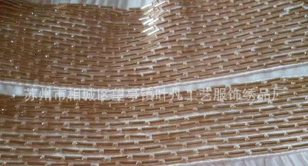 機(jī)器訂珠織帶